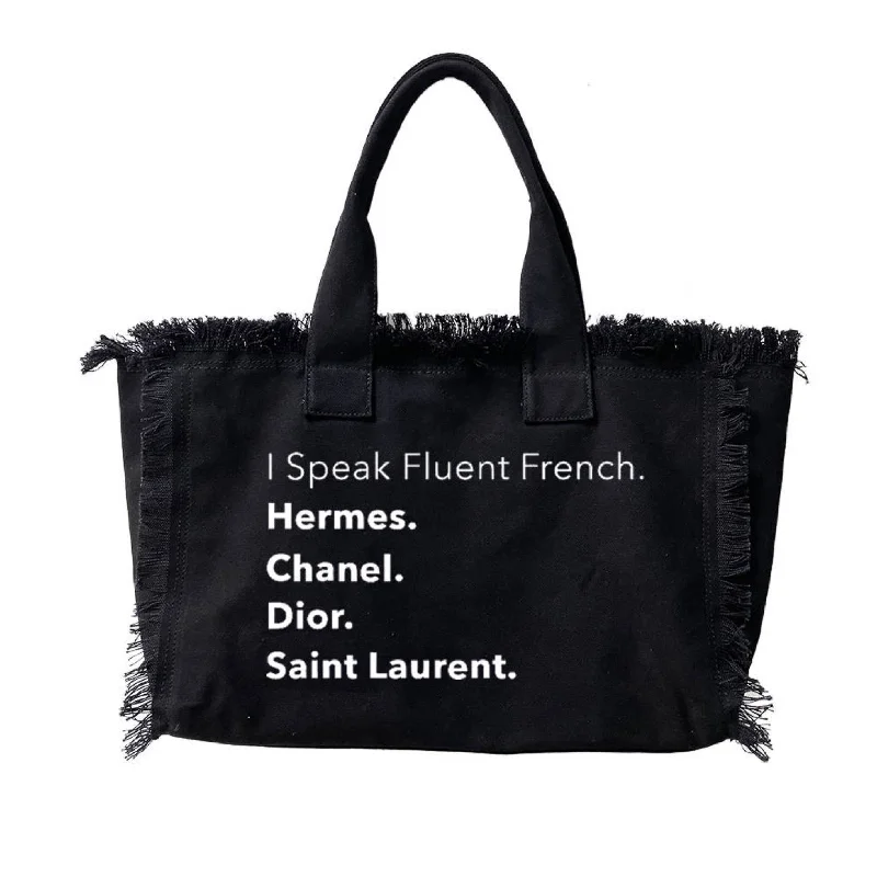 High-Quality Bags On Flash Sale I Speak Fluent French Canvas Fringe Tote - Black