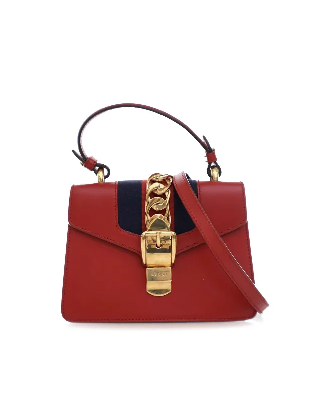 Bold Fashionistas Mini Calfskin Sylvie Satchel with Detachable Strap and Push Lock Closure