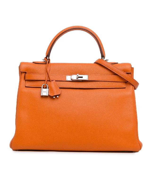 Bags For Urban And Trendy Looks Togo Leather Kelly Bag with Detachable Strap and Twist Lock Closure