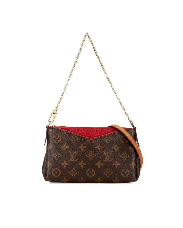 Senior Travelers Monogram Canvas Clutch with Leather Trim and Gold-tone Chain Handle